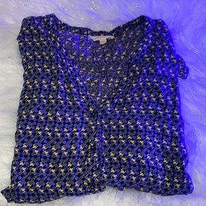 A long sleeve blue yellow tan lock shirt